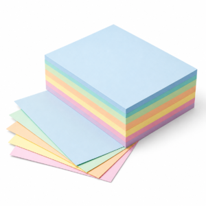 Pastel coloured paper stack on a white background